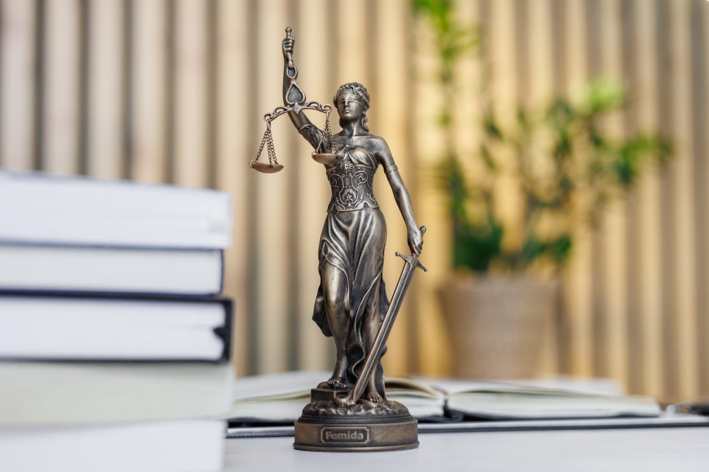 statuette of themis the goddess of justice stand 2023 11 27 04 59 06 utc 2 1024x683 1